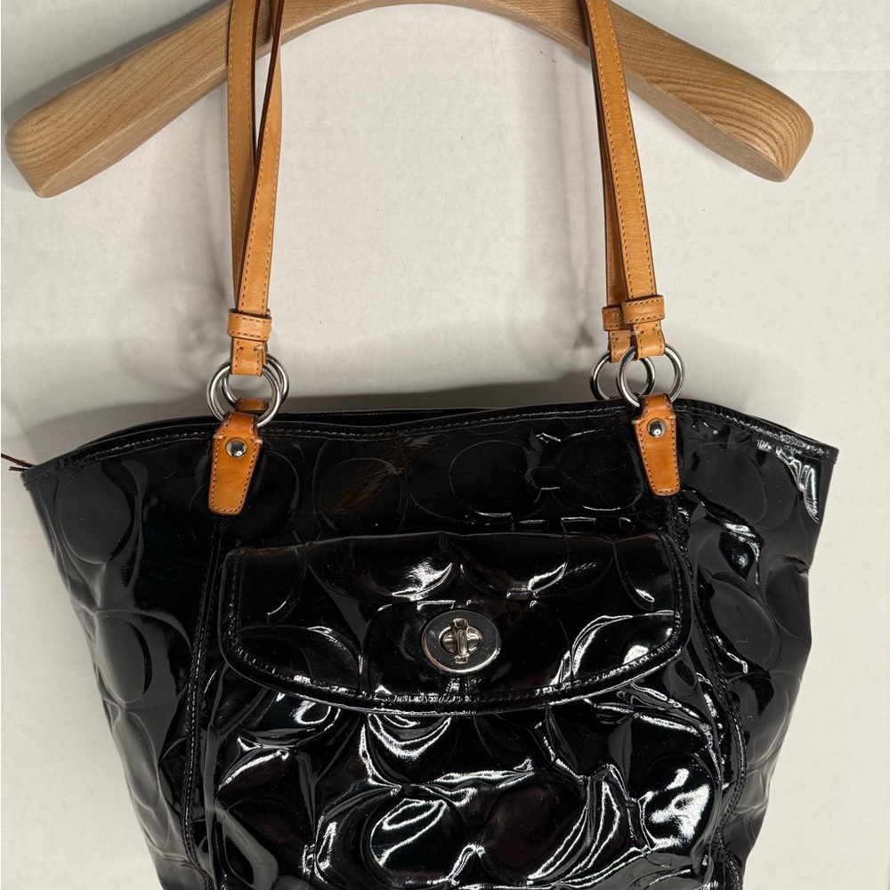 Coach black signature embossed patent leather tote bag
